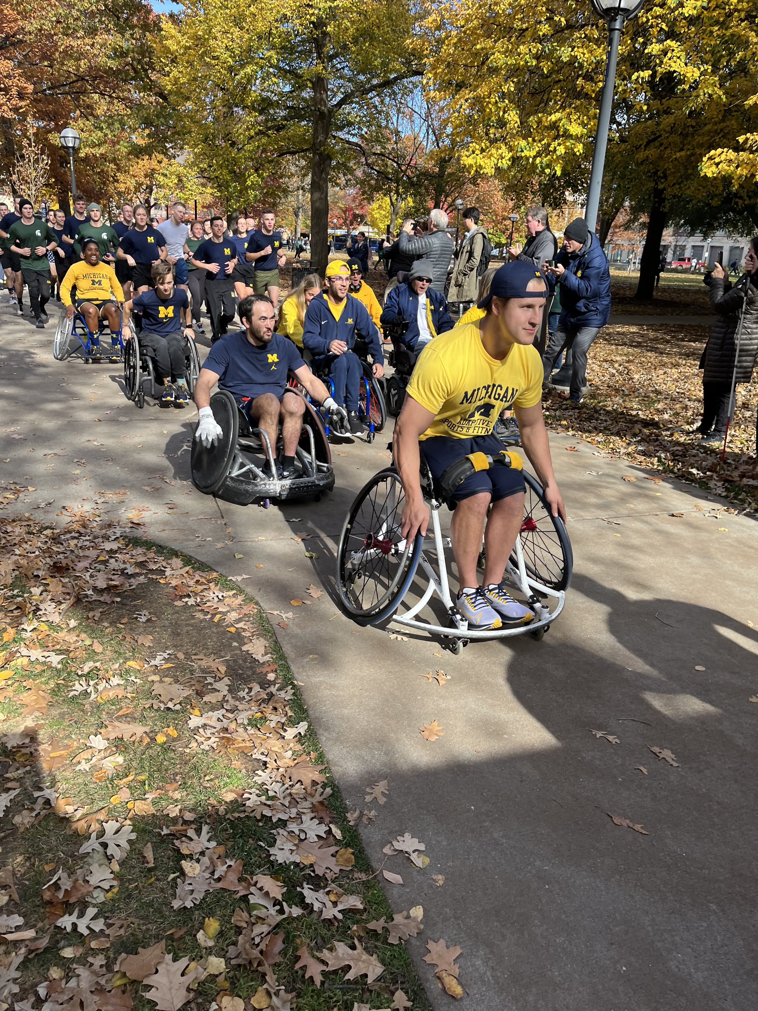 Adaptive Sports participants nearing the finish line at the 2022 AGSR Race. 