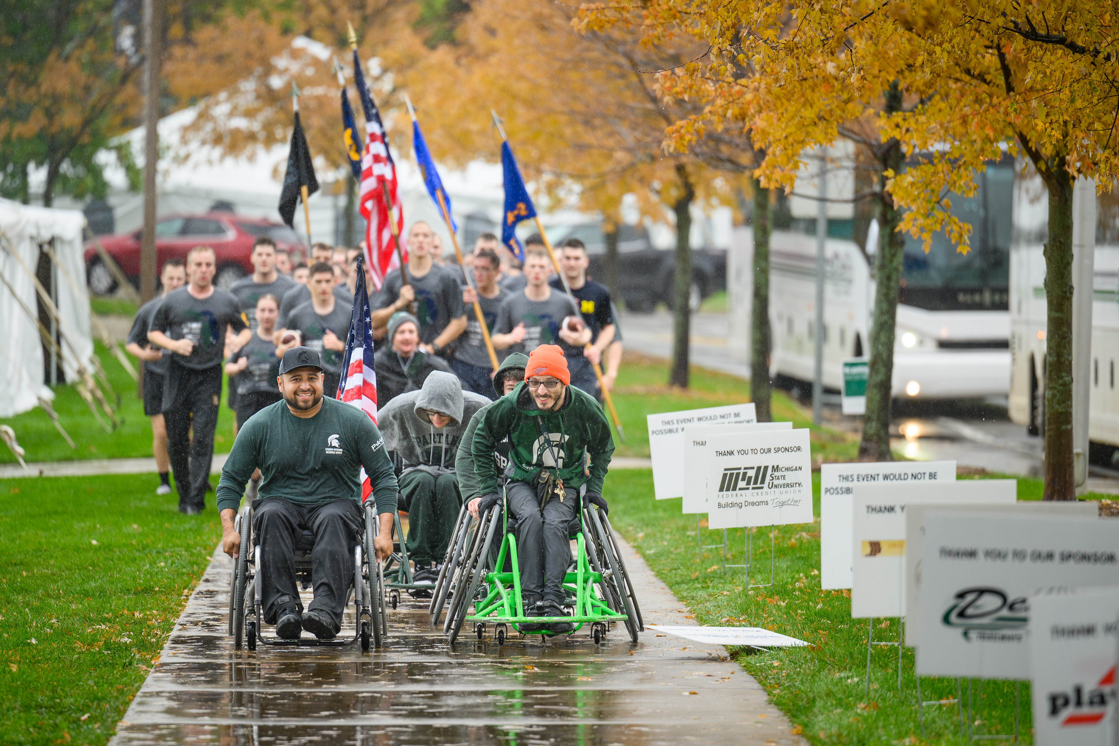 Rollers heading into the finish line with cadets running behind them