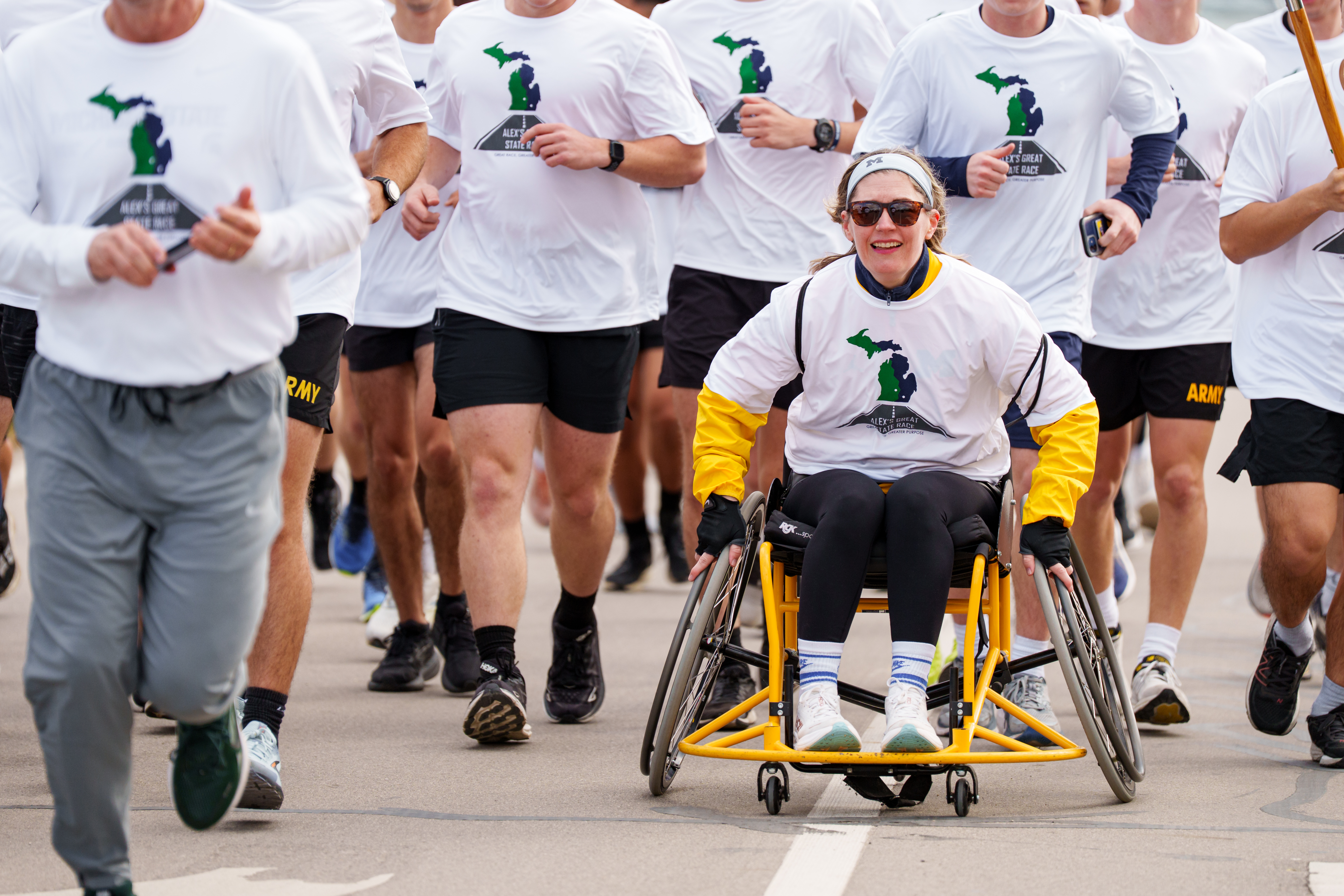 UM Adaptive athlete rolling in the last mile