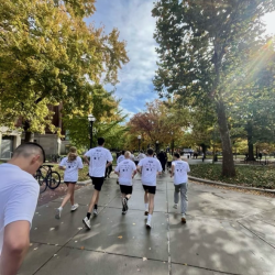 Group of ROTC runners heading toward finish line